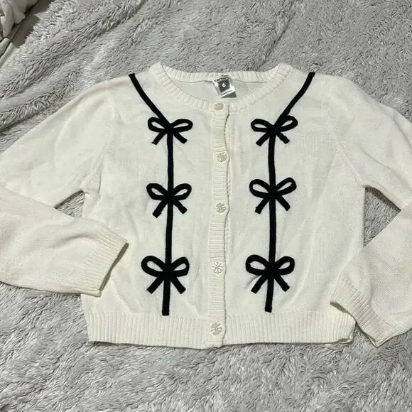 Carters 6 creamy white black bow appliqués cardigan cotton blend euc holiday