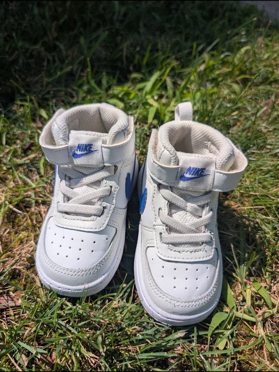 Nike Toddler White Sneakers with Blue Swoosh