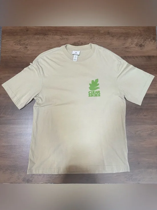 H&M Size S Sage Green Tee with Green 'Clear Skies' Graphic on Back