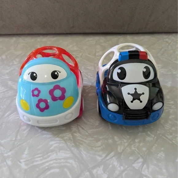 Bright Starts Oball Go Grippers‎ Toy Car Set Floral and Police Cruiser 2 Pack