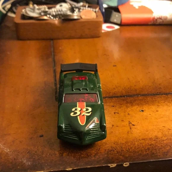 Green #32 Toy Race Car with Red Accents