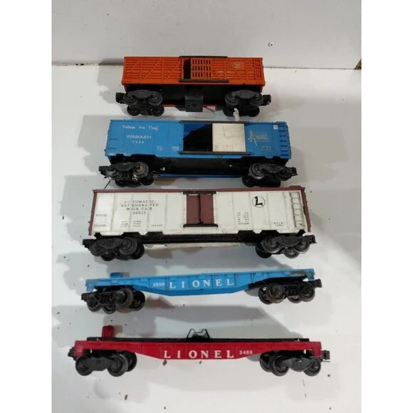 5 Lionel O Gauge Model Railroad Post War Freight Cars (Flat Brakeman Milk Cattle