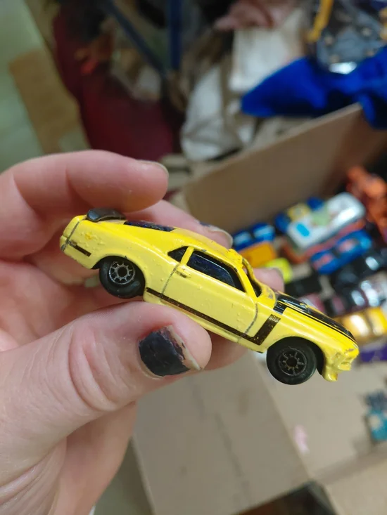 1:64 scale die-cast model of a 1970 Ford Mustang Boss 302,