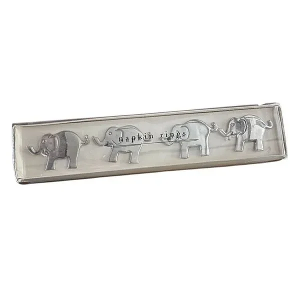 Pier 1 Imports 4 Nickel Plated Elephant Shaped Napkin Rings