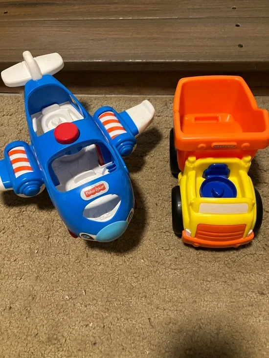 Fisher-Price, musical airplane and musical dump truck