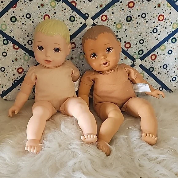 2 cute soft body dolls blonde hair and dark