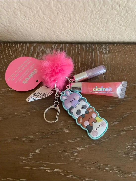 💖 Pick three $15 - Claire’s Pom Keychain with Animal charm and Lip Gloss Set