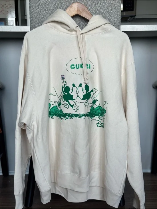 Gucci Cream Hoodie with Green Disney Graphic