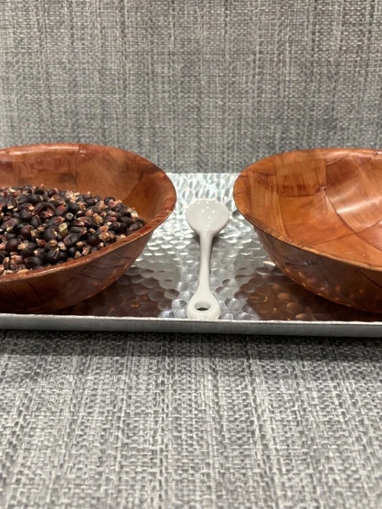 wood bow, metal tray & porcelain spoon spooning materials by idlewild montessori