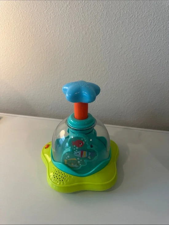 Blue & Green Star Pop-Up Learning Toy with Orange Push Handle cause effect toy