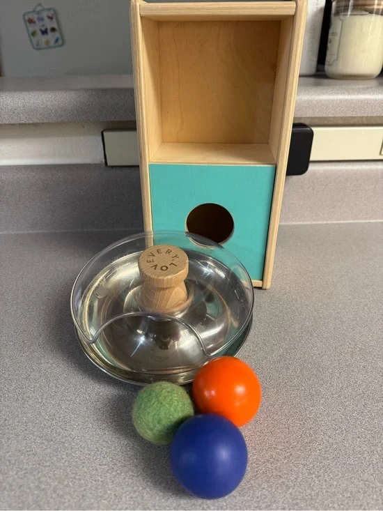 Lovevery slide top box and stainless steel tip & turn plus 3 different balls