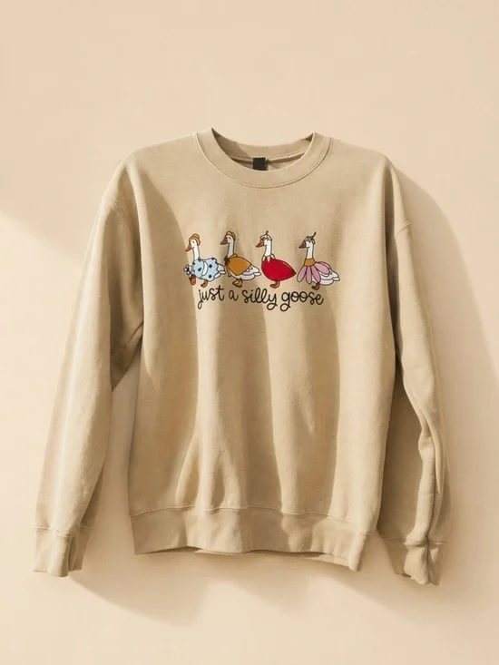 5/$25 🎉 - Just a Sillg Goose Cream Graphic Women's Sweater