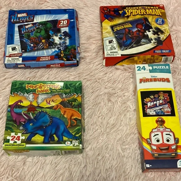 Four various children’s puzzles