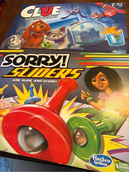 Hasbro Sorry! Sliders Board Game and CLUE something’s fishy