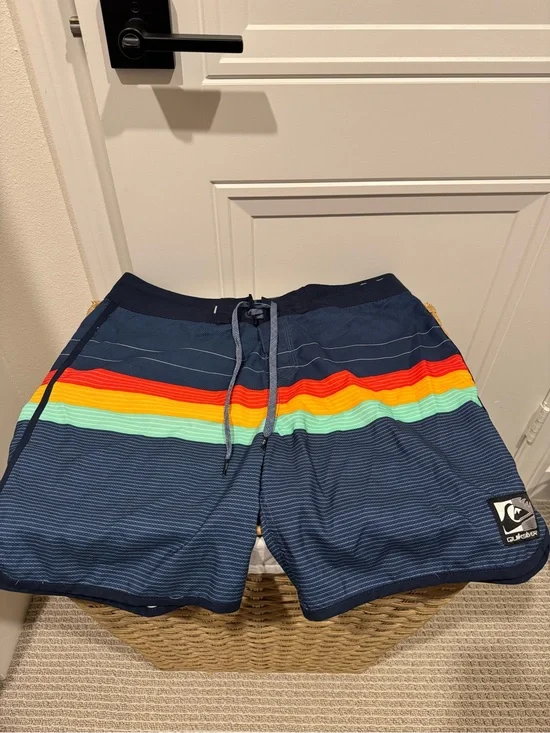 Quiksilver Men’s Navy Swim Board Shorts with Red, Orange, Yellow & Aqua Stripes