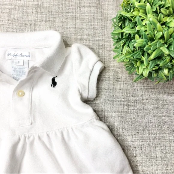 Ralph Lauren children’s wear ruffled polo dress, lace trimmed hem