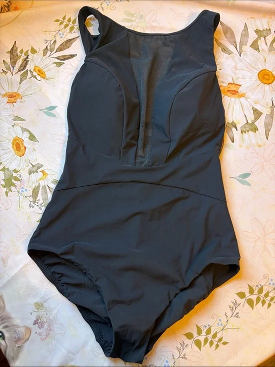 Sleek Black One-Piece Swimsuit with Sheer Front Panel