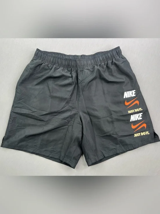 NIKE MENS STACK LOGO 7” LIGHTWEIGHT MESH LINED VOLLEY SWIM TRUNKS