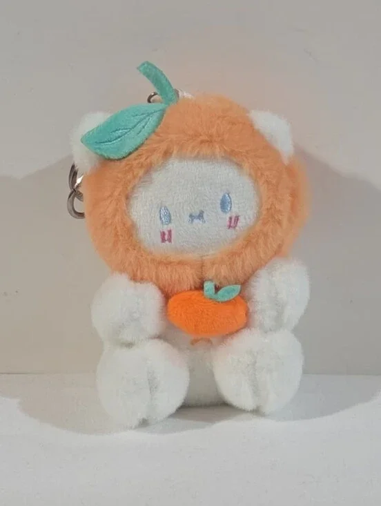 white bear with orange hat plushie keychain