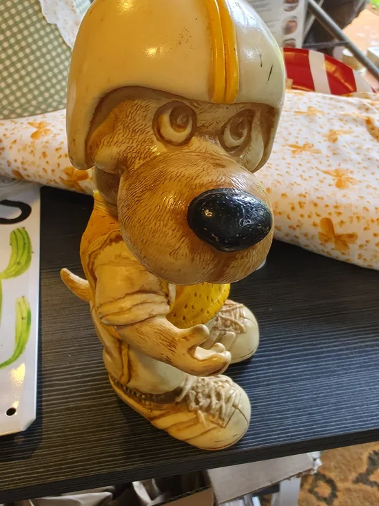 Vintage Dog Figurine Wearing Helmet - Yellow Accent
