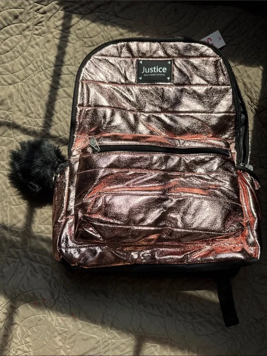 Justice Metallic Rose Gold Backpack with Black Pom