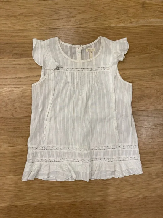 White Ruffled Sleeveless Blouse with Lace Trim