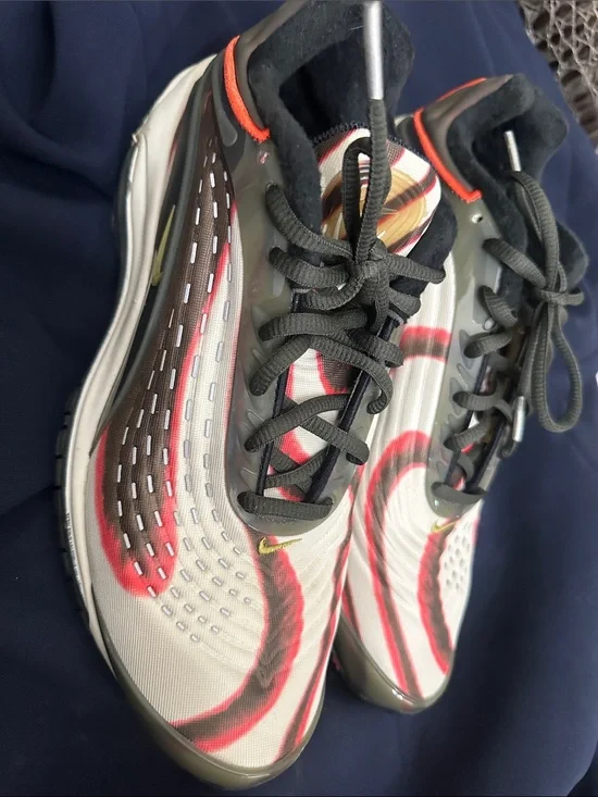 Nike White Sneakers with Red and Black Accents