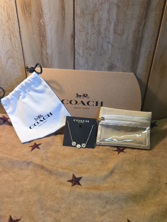 Coach Gold Daisy Pendant Bracelet with Beige Accessories