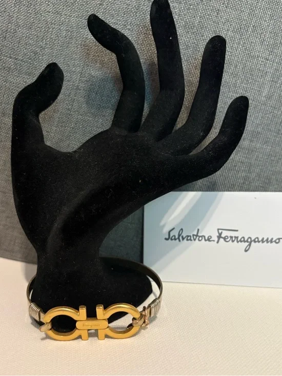Authentic Salvatore Ferragamo charm set on unbranded bangle bracelet