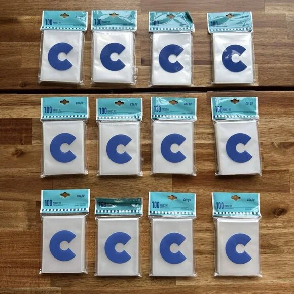12 New Colqu Penny Trading Card Sleeves packs of‎ 100 Each (1200 Total Sleeves)