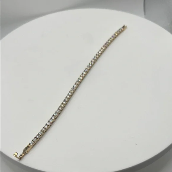 504.Gold Plated over Stainless Steel Tennis Bracelet w/ Swarovski Crystals.