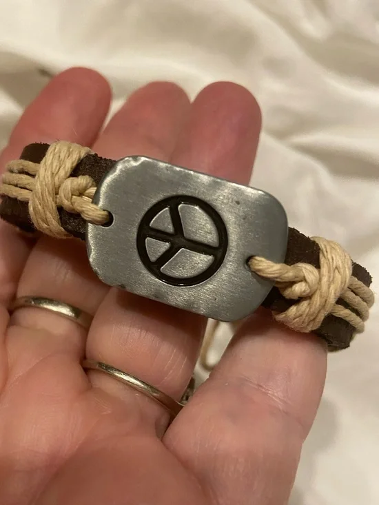 Brown Leather Bracelet with Peace Sign Metal Accent and Cream Cord