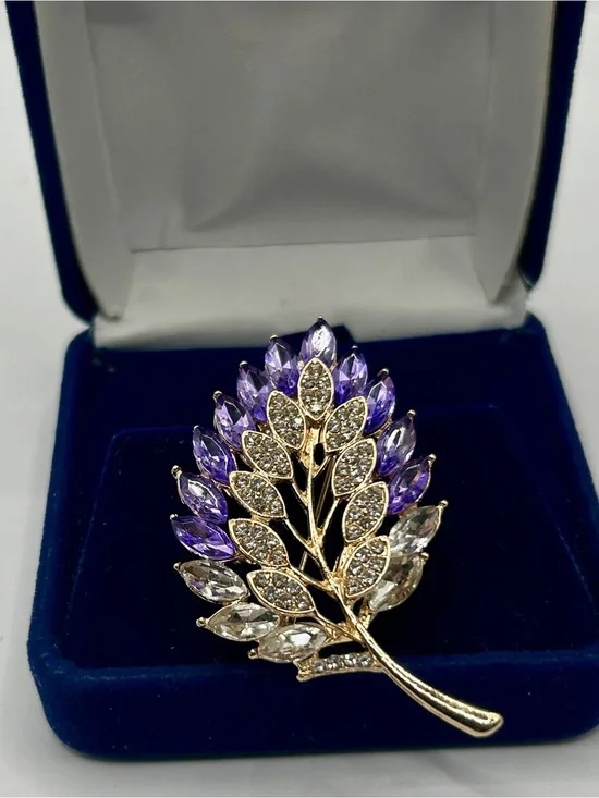 Gold Tone Leaf Brooch with Purple and Clear Faceted Glass Jewels​