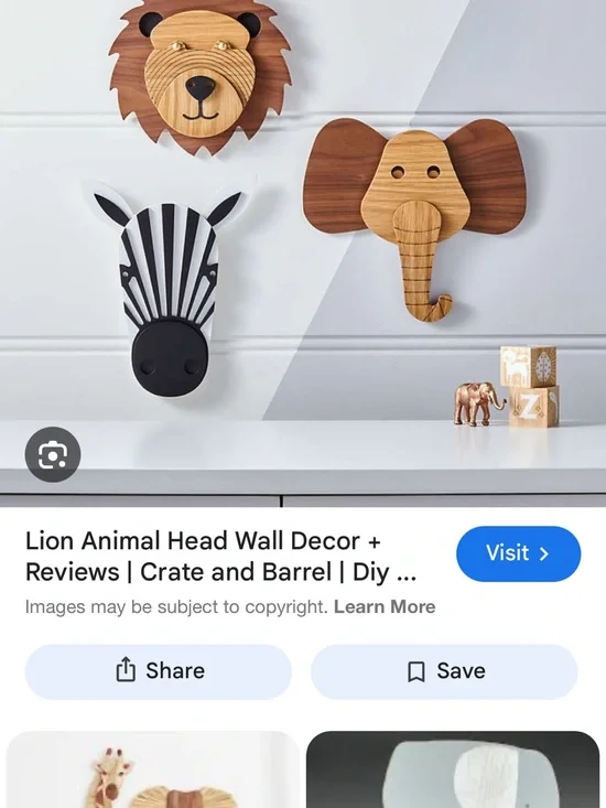 Crate&Barrel Wooden Animal Head Trio Wall Hooks in Brown and Black