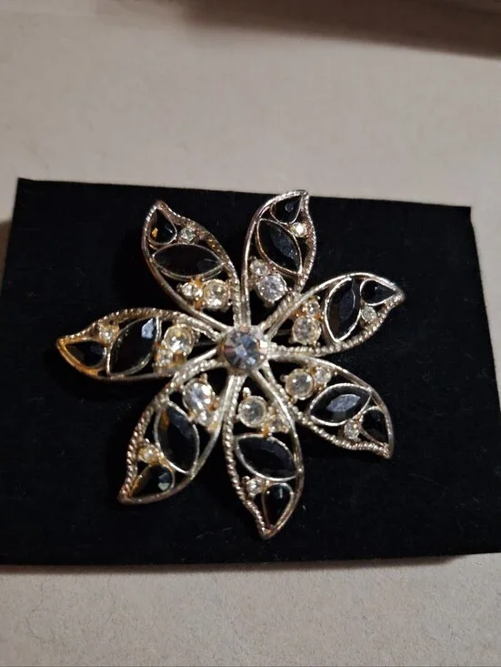 Silver-Tone Floral Crystal Brooch with Black Accents