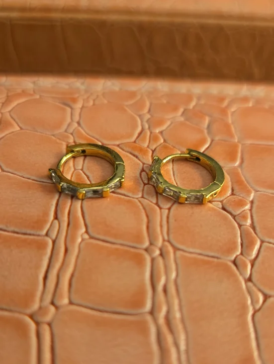 Gold Colored Hoop Huggie Earrings with Clear Stones