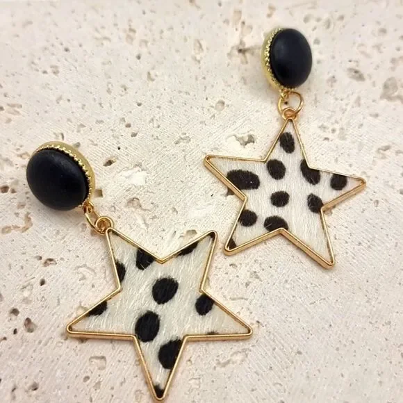 FREE PEOPLE City slickers faux cow hyde star earrings | NWOT