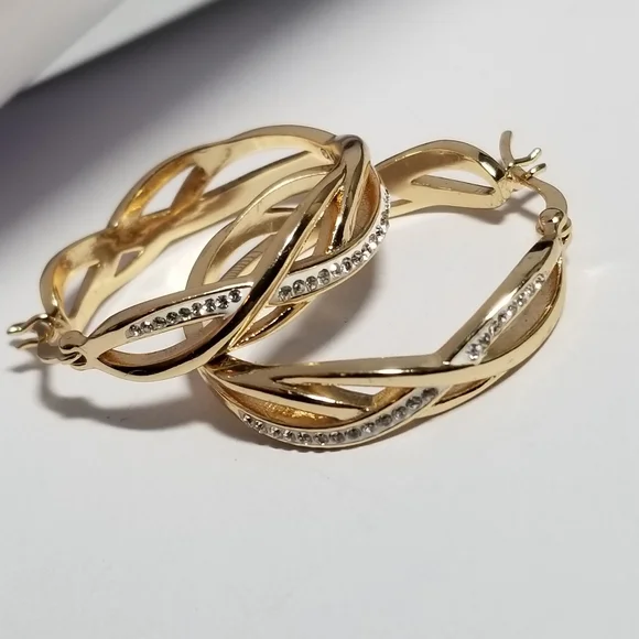 Hoop earrings braided look with sparkly clear crystals gold tone