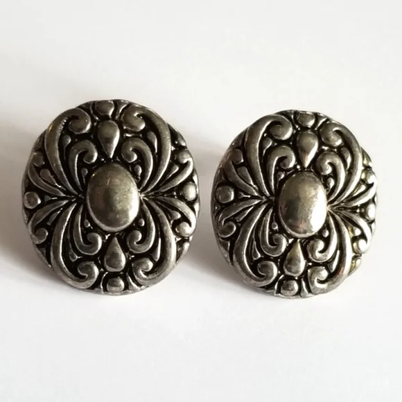 Earrings Silver tone earrings oval stud scrolled design