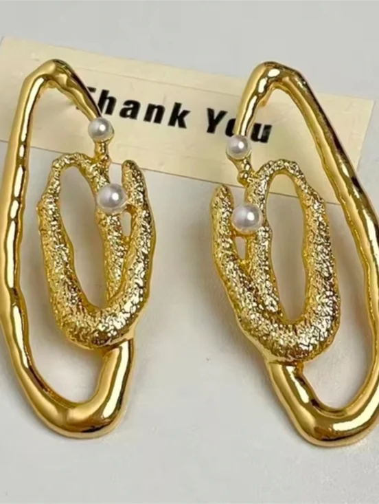 Gold tone Textured Loop Earrings with Pearl Accents