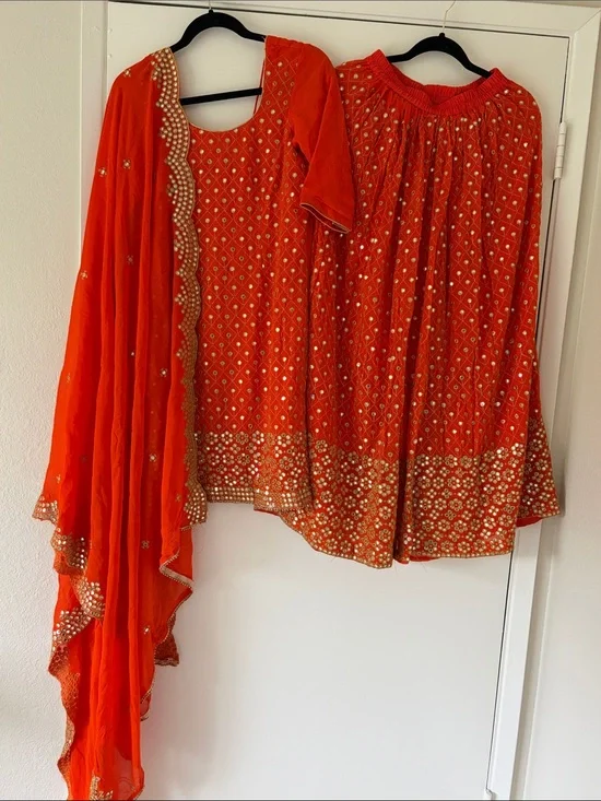 Embroidered Orange Ethnic Lehenga Set with Gold Mirror Work