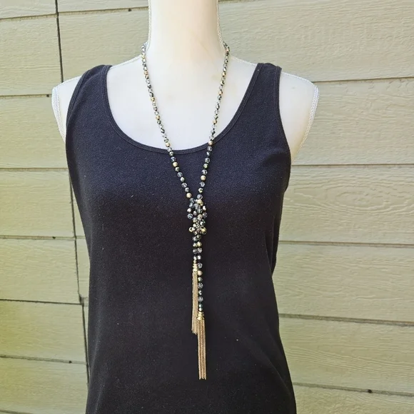 gold tone and gray crystal beaded necklace with gold chain tassel