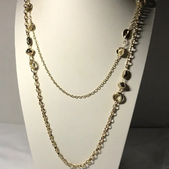 Shiny gold tone necklace/ double strands in very good pre-owned condition