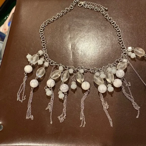 SILVER necklace with tassels and beads.