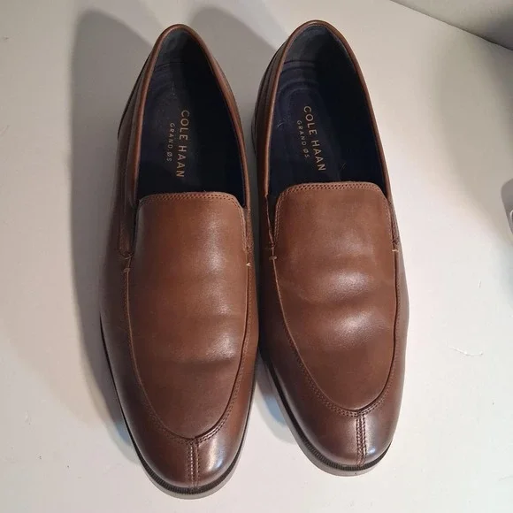 Mens brown leather loafers slip onCole Haan new condition no flaws