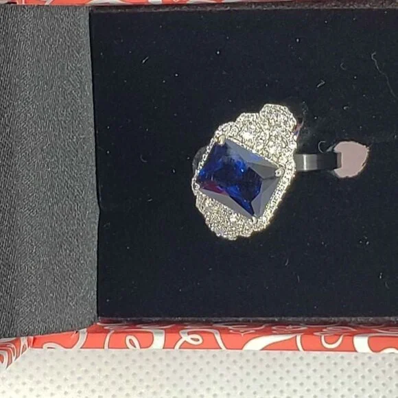 Brand New 18k White Gold Plated ring with cubic zirconia stones & blue gemstone