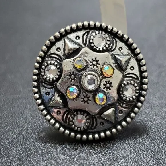 Silver tone circular sparkly ring