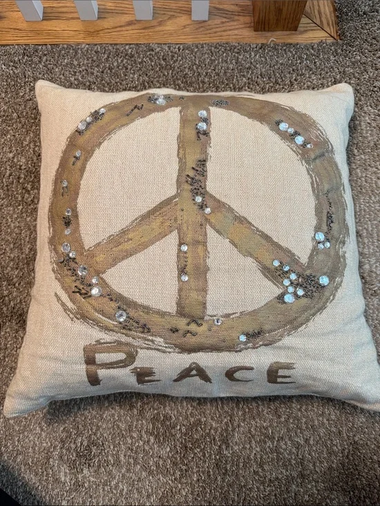 Pottery Barn Beige Pillow with Gold Peace Sign Embellishment