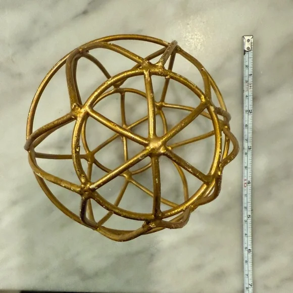 Gold round sculpture