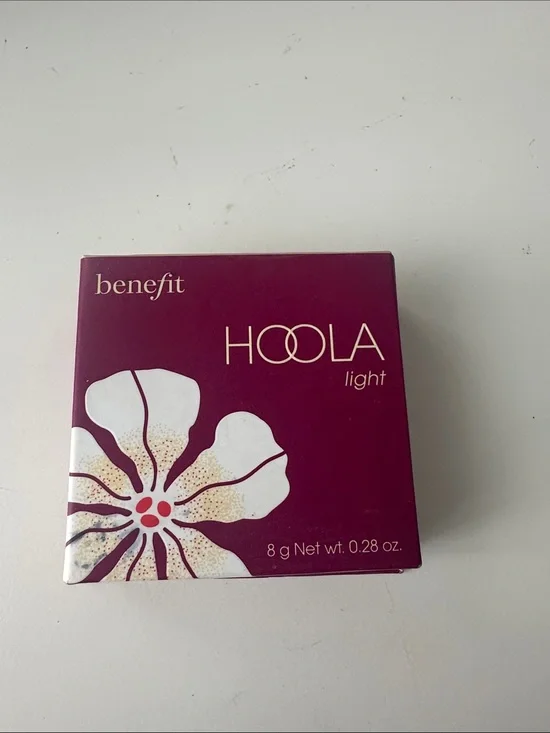 Benefit Hoola Light Bronzer - Plum Packaging with White Floral Accent